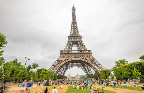 PARIS - JUNE 21, 2014: Tourists enjoy Eiffel Tower view from Cha