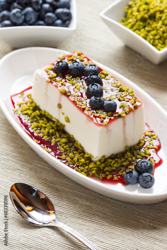  fancy panna cotta with blueberries and pistachio