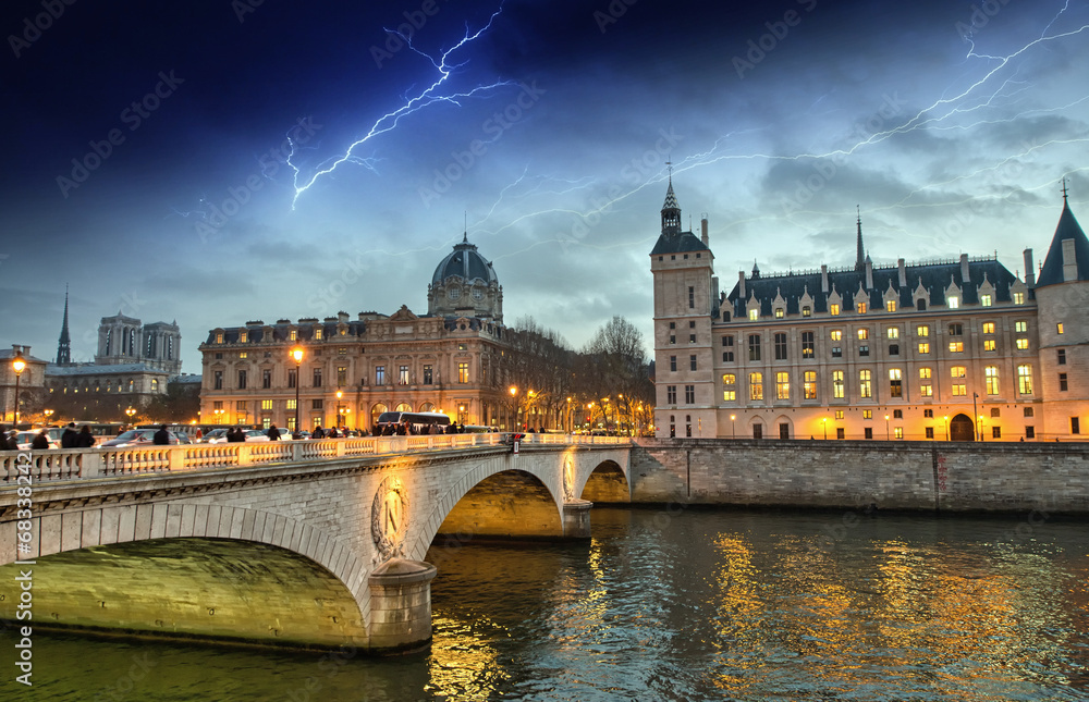 Beautiful colors of Napoleon Bridge with storm with Seine river