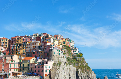 Multi-colored houses in Manarol s fishing small village. Italy
