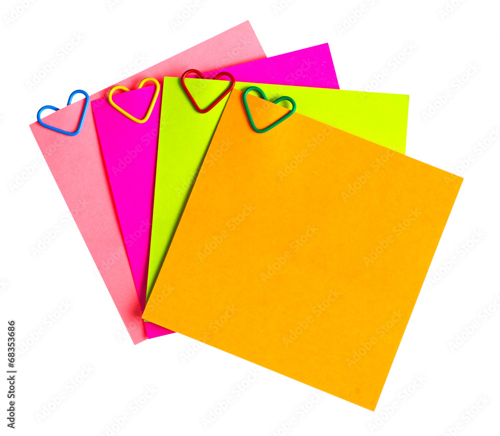 reminder paper and clip in the form of heart isolated on white