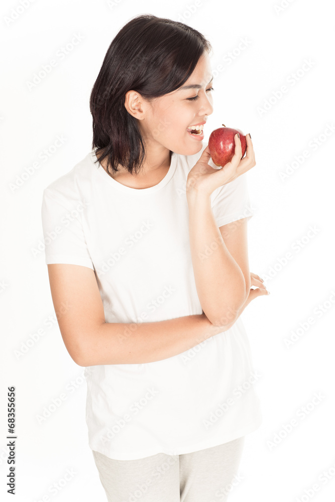 Smiling woman with apple isolated on white Smiling woman with apple isolated on white