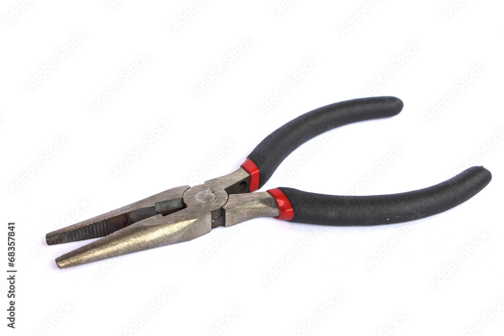 Rusty pliers over white background Rusty pliers over white background