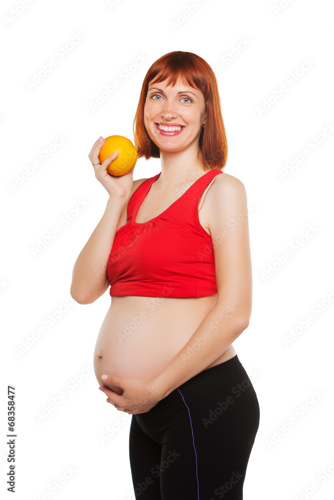 pregnant woman and orange. isolated on a white background pregnant woman and orange. isolated on a white background