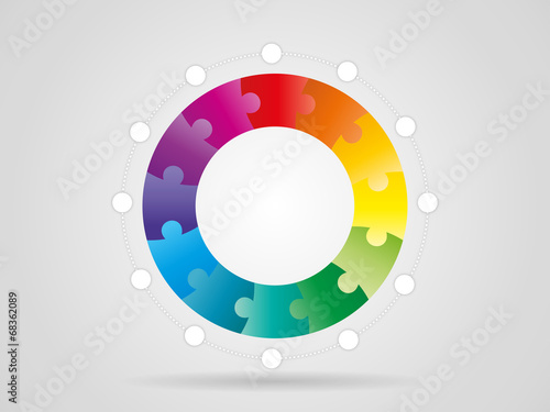 Colorful spectrum rainbow puzzle pieces forming a circle