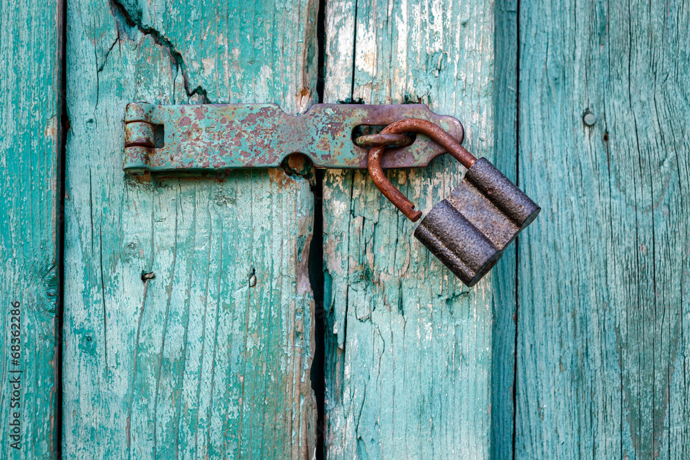 Old padlock closeup. Old padlock closeup.
