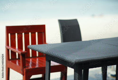 Empty table on the beach  depth of field