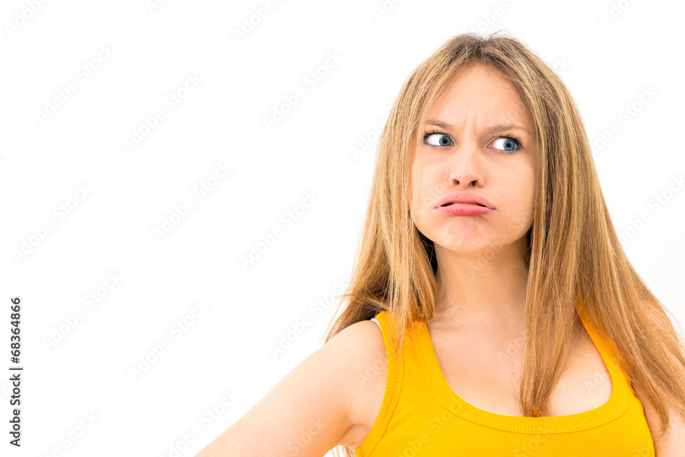 Young woman making a funny grimace Young woman making a funny grimace