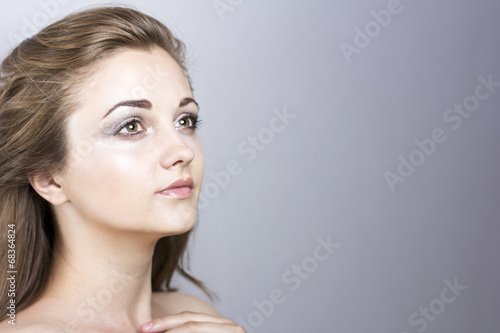 Beautiful girl with a gentle makeup