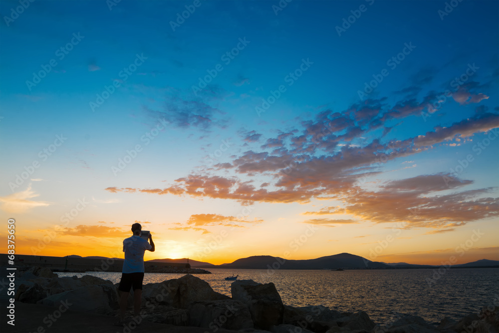 photographer at dusk