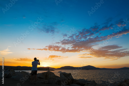 photographer at dusk