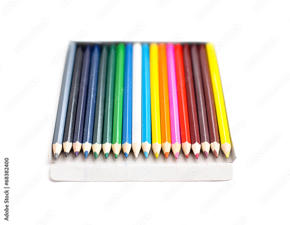 A stack of colored pencils on white background A stack of colored pencils on white background