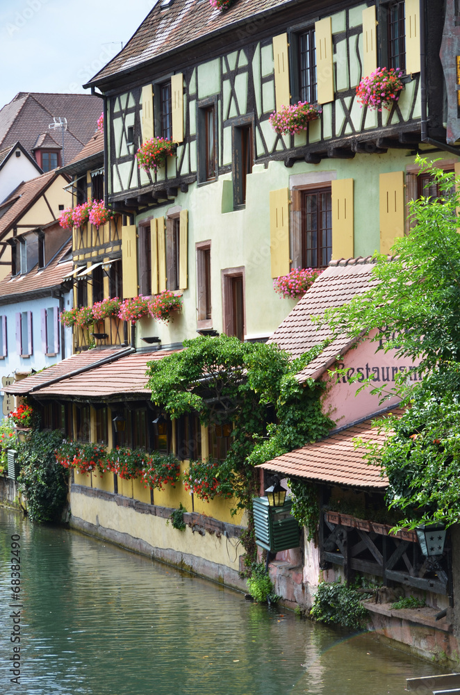 Colmar, Petit Venice, water canal and traditional colorful house