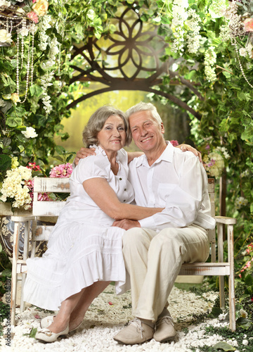 Elderly couple on wooden porch © aletia2011