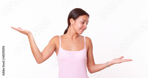 Cute young girl holding her palms up