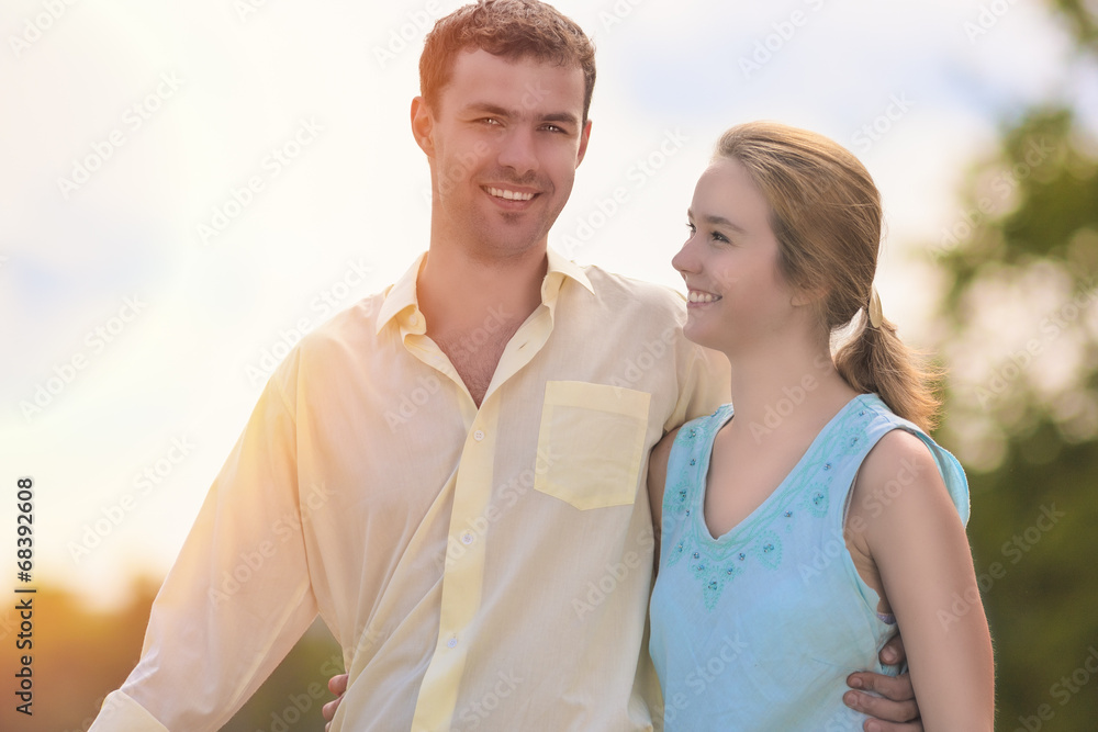 Happy Caucasian Couple Relationships. Sweethearts in the Park Happy Caucasian Couple Relationships. Sweethearts in the Park