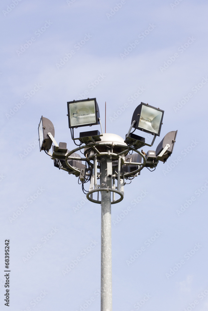 Stadium football game light pole in daytime. Stadium football game light pole in daytime.