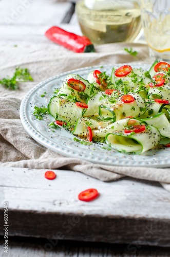 Salad with cucumber, pepper and poppy seeds