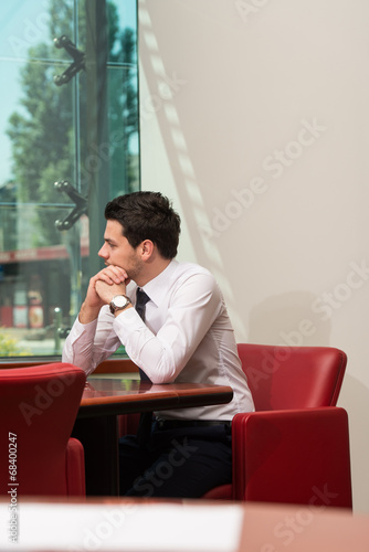 Young Businessman Having Stress In The Office