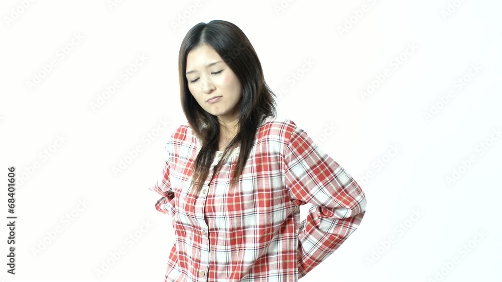 腰痛に悩む女性 腰痛に悩む女性