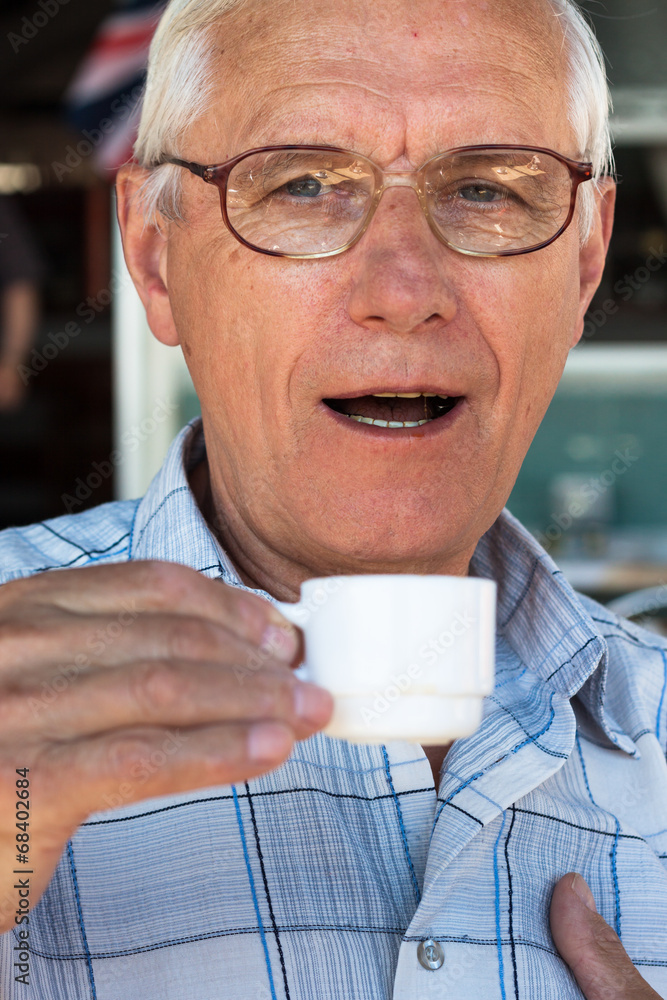 Senior man drinking coffee Senior man drinking coffee