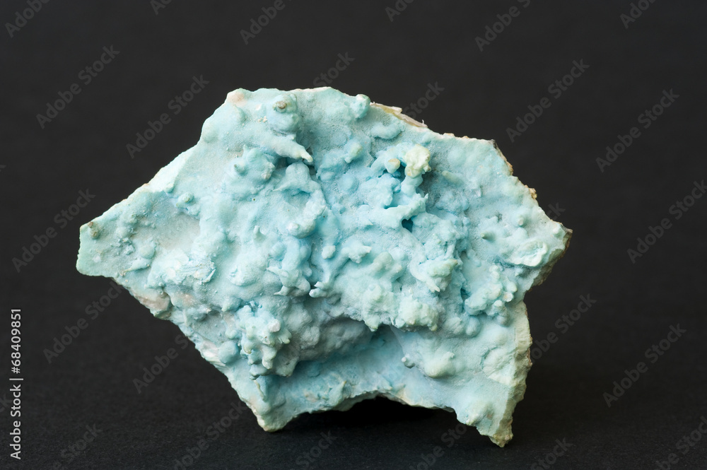 Blue aragonite covered with celadonite. 8cm across. Blue aragonite covered with celadonite. 8cm across.