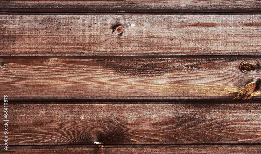 Fototapeta premium Wooden background. Simple wooden planks with branches.