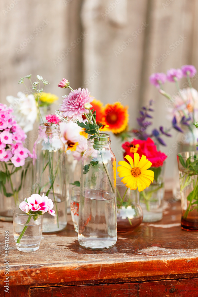 nice flowers in the bottles nice flowers in the bottles