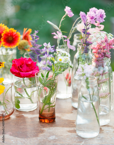 Fototapeta Naklejka Na Ścianę i Meble -  nice flowers in the bottles