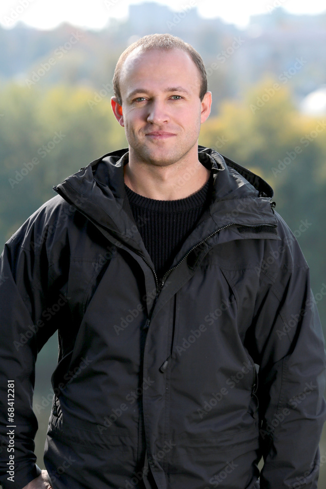 Portrait of handsome young man in park Portrait of handsome young man in park