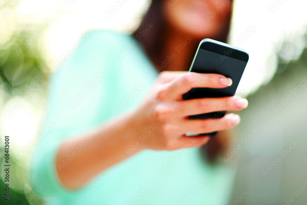 Closeup portrait of a woman using smartphone Closeup portrait of a woman using smartphone