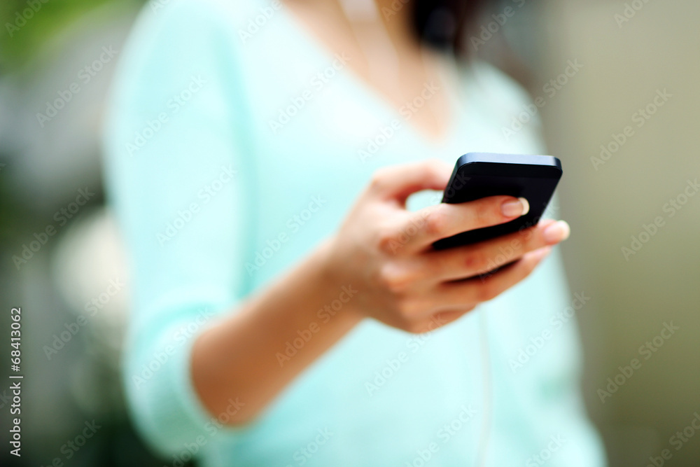 Closeup portrait of a woman using smartphone Closeup portrait of a woman using smartphone