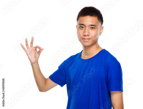 Asian young man with ok sign