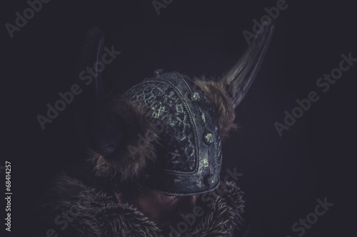 Costume  Viking warrior with a huge sword and helmet with horns