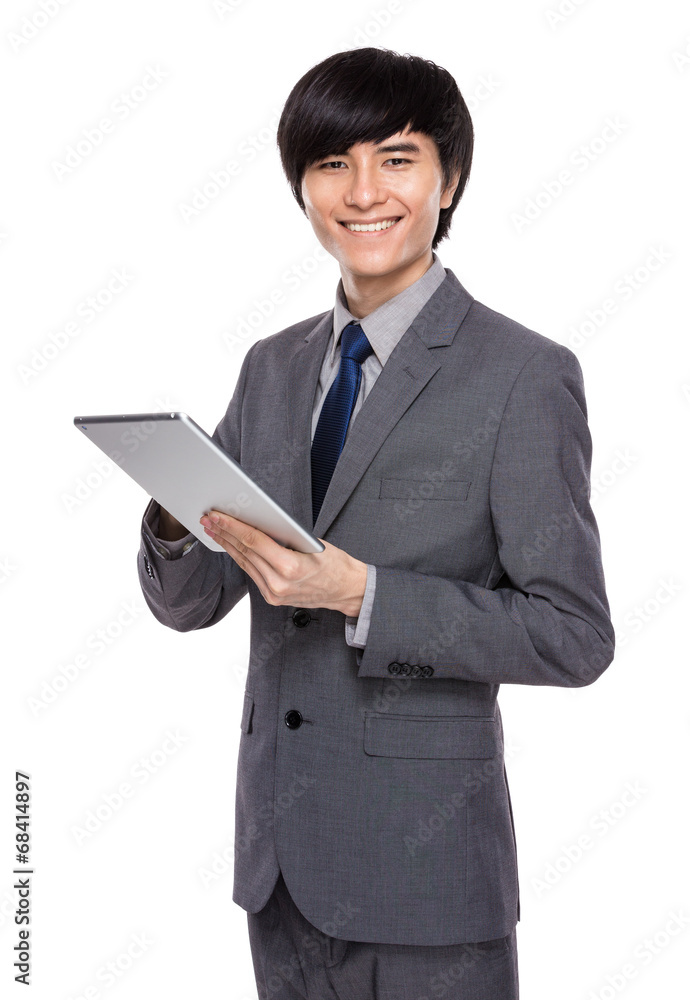 Young businessman use digital tablet Young businessman use digital tablet