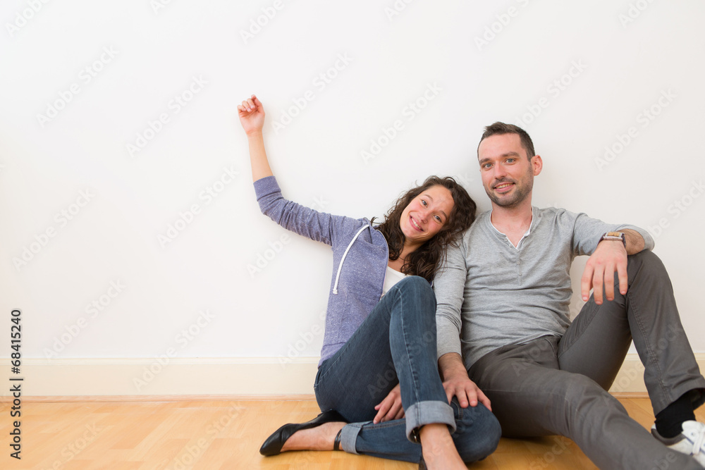 Young couple in their brand new flat / Textspace Young couple in their brand new flat / Textspace