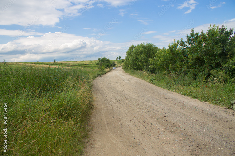 road in green field