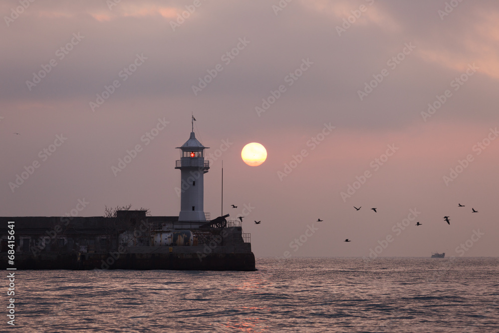 Lighthouse on sunrise