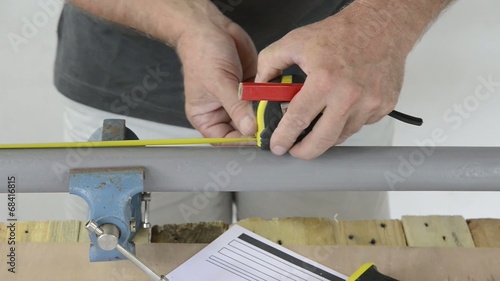 Wallpaper Mural a man made a piece of furniture with various carpentry tools Torontodigital.ca