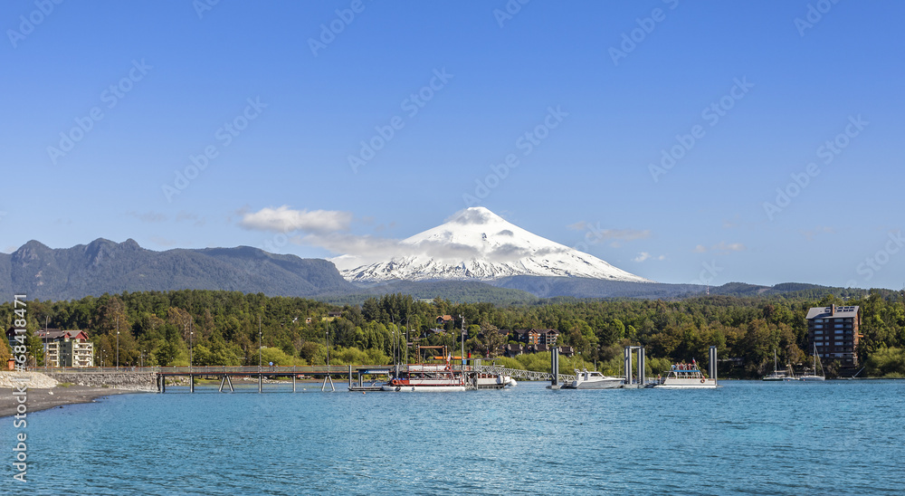 Lake in Pucon and snow covered Volcano Villarica, Chile.