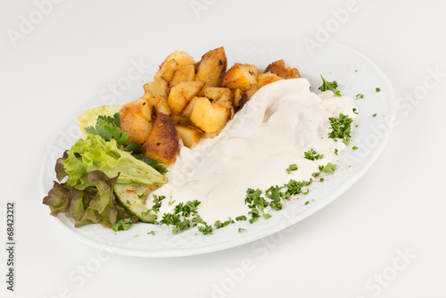 Sahnehering mit Bratkartoffeln photo