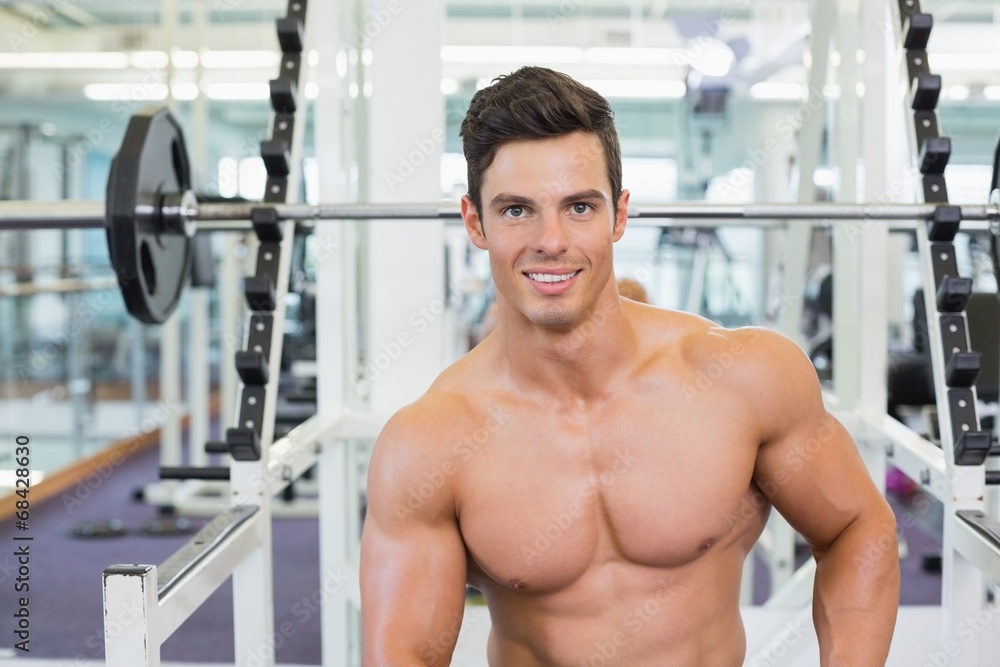 Fototapeta premium Portrait of a muscular man in gym