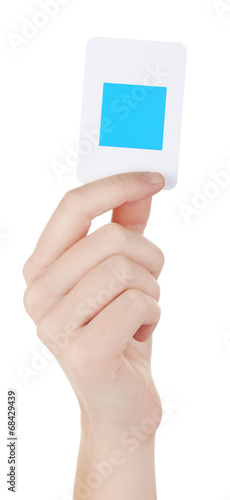 Educational card with color geometric shape in hand, isolated