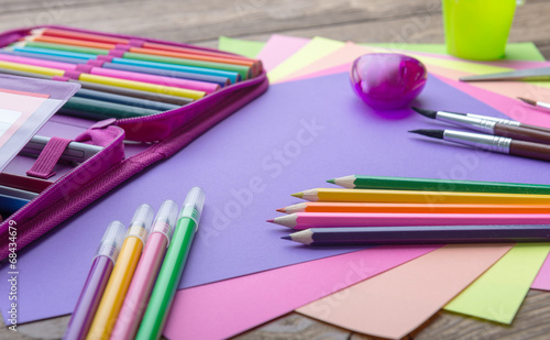 Many school stationery in a heap, cozy colors