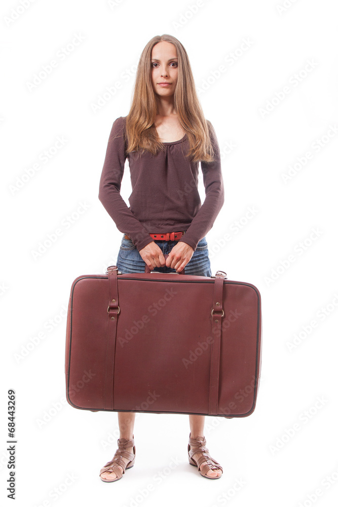 Girl standing with suitcase. Isolated on white Girl standing with suitcase. Isolated on white