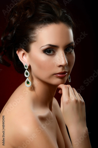 The beautiful woman in jewelry earrings