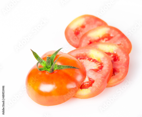 Fresh tomatoes with water drops on white background