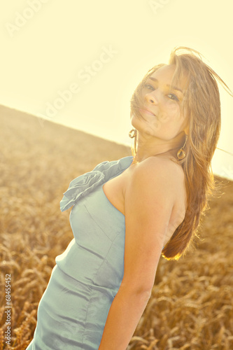 Young girl at wheat field