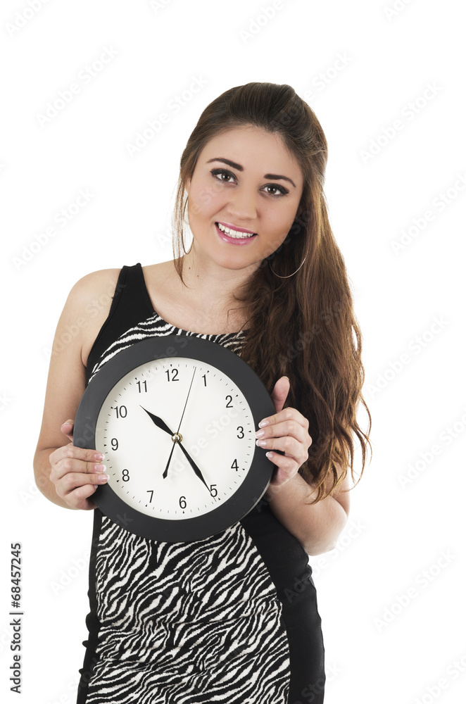 Pretty young hispanic girl holding black round clock Pretty young hispanic girl holding black round clock
