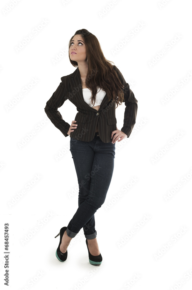 Fototapeta premium Fullbody shot of casual young beautiful brunette girl posing